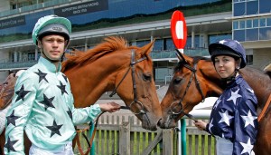 Oli Lawrence in the light blue of Cambridge and Lizzy Hamilton wearing Oxford's dark blue are in training as the Universities prepare to go head to head at Newmarket. Pic: Steven Cargill (Courtesy of Great British Racing)