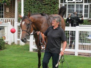 Tenor and his groom in the winners enclosure at Sandown Park.