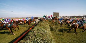 Auroras Encore and Ryan Mania (no 35) jumping the chair  winning The John Smith's Grand National.  Pic: Dan Abraham - racingfotos.com 