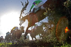Mon Mome and Liam Treadwell jumping the chair on his way to winning The John Smith's Grand National Pic Dan Abraham - racingfotos.com  