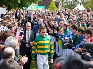 Tony McCoy received a terrific send-off from racegoers as Sandown where he was awarded a the jockeys' title on the day he retired from race-riding. Pic: Great British Racing.