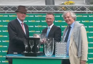 John Gosden (left) and winning connections after Western Hymn's victory.f