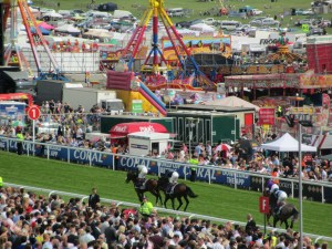 Runners go down to the start on Derby Day 2014.