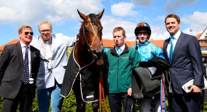 Brown Panther and Richard Kingscote after winning The Boodles Diamond Ormonde Stakes with (left to right) Trainer Tom Dascombe, Andrew Black, stablehand, jockey Richard Kingscote and Michael Owen. Pic Dan Abraham - racingfotos.com (Courtesy of Great British Racing).